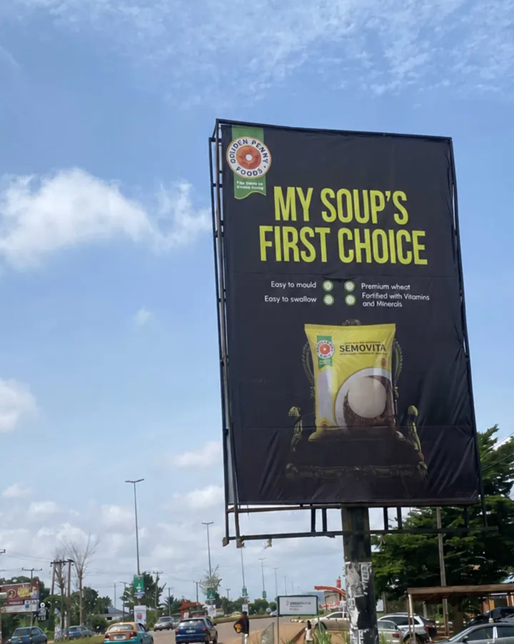Golden Penny Semovita unipole billboard against the sky in Akure, put up by Beyond Home for FMN