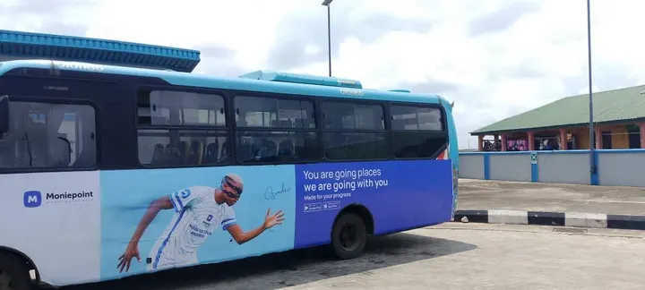 Full side wrap on a blue Lagos BRT bus